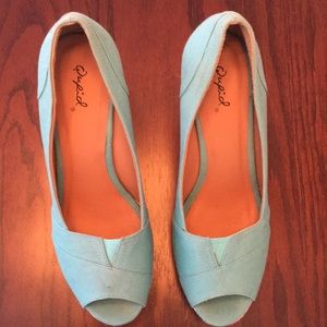 Sassy turquoise Qupid wedges